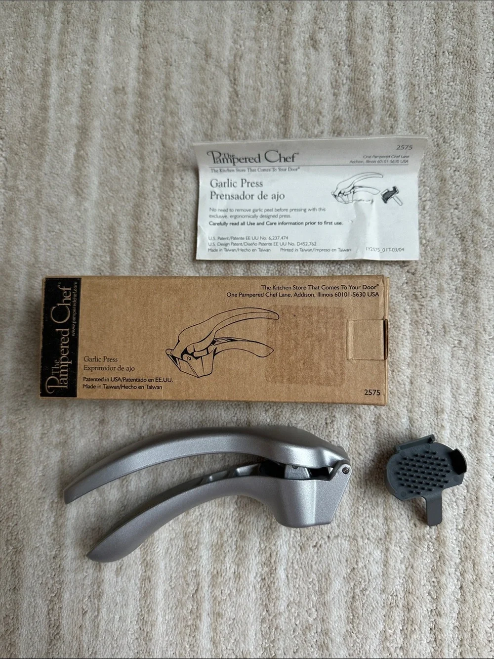 The Pampered Chef Metal Garlic Press #2575 with Cleaning Tool